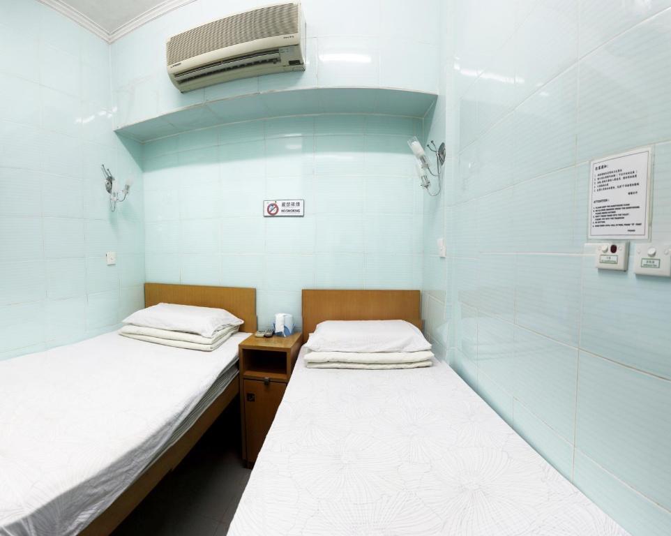 Двухместный (Двухместный номер с 2 отдельными кроватями) гостевого дома Oi Suen Guesthouse, Гонконг (город)