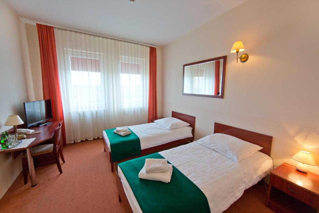 Двухместный (Двухместный номер с 2 отдельными кроватями) отеля Hotel Kameralny, Кельце