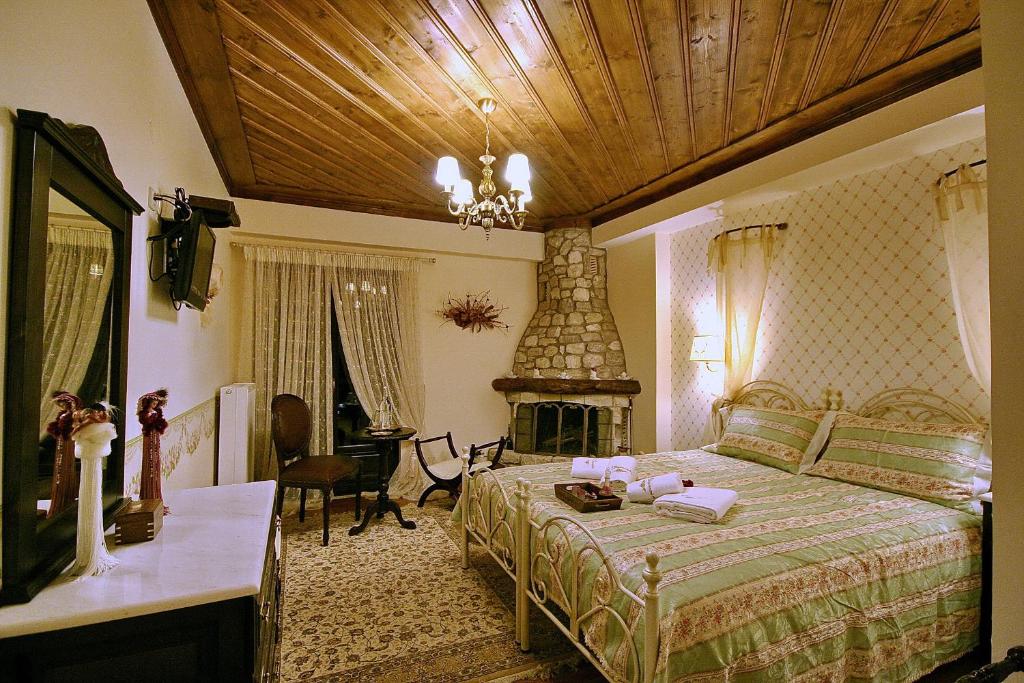 Трехместный (Deluxe Room with fireplace (3 adults)) гостевого дома En Dimitsani, Димитсана