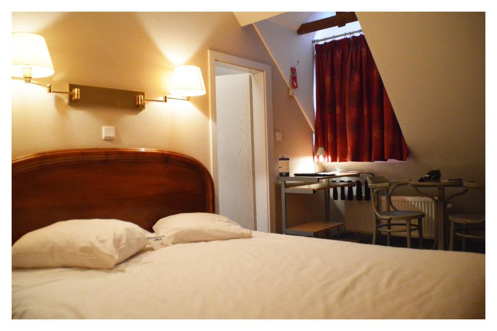 Двухместный (Двухместный номер с 1 кроватью - Мансарда) отеля Hotel La Porte de France, Бульон