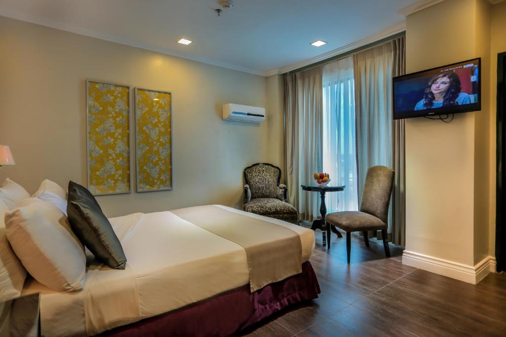 Двухместный (Двухместный номер Делюкс с 1 кроватью) отеля MetroCentre Hotel, Панглао