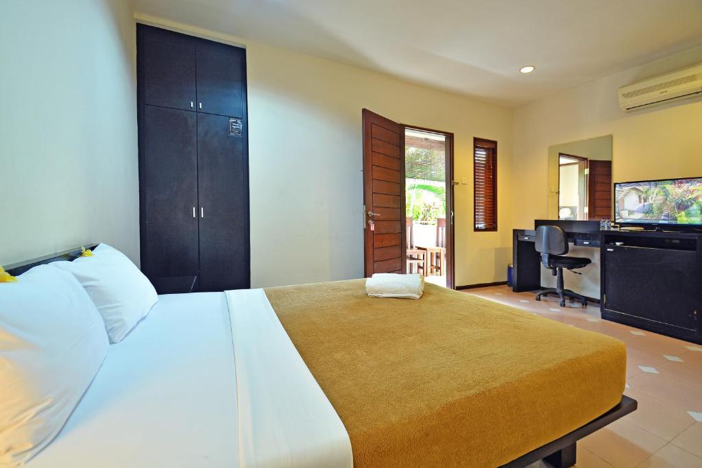 Двухместный (Двухместный номер Делюкс с 1 кроватью) апарт-отеля Taman Ayu Town House, Денпасар