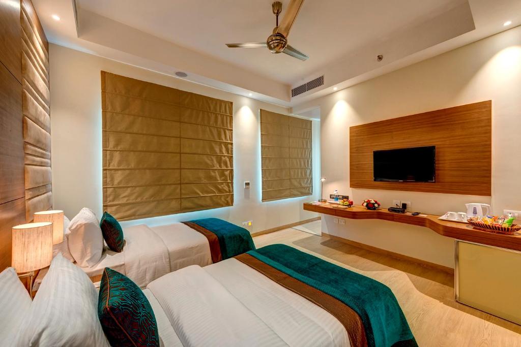 Двухместный (Двухместный номер Делюкс с 1 кроватью или 2 отдельными кроватями) отеля The Astor, Калькутта