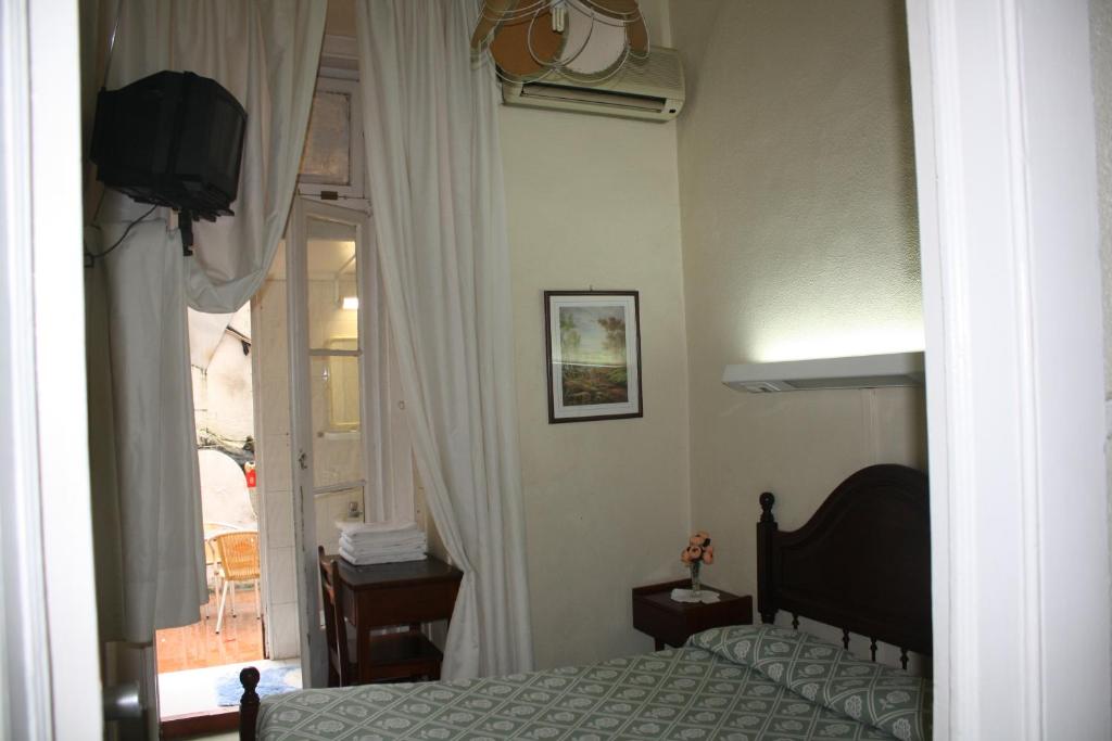 Одноместный (Одноместный номер) гостевого дома Pensao Residencial Estrela do Mondego, Лиссабон