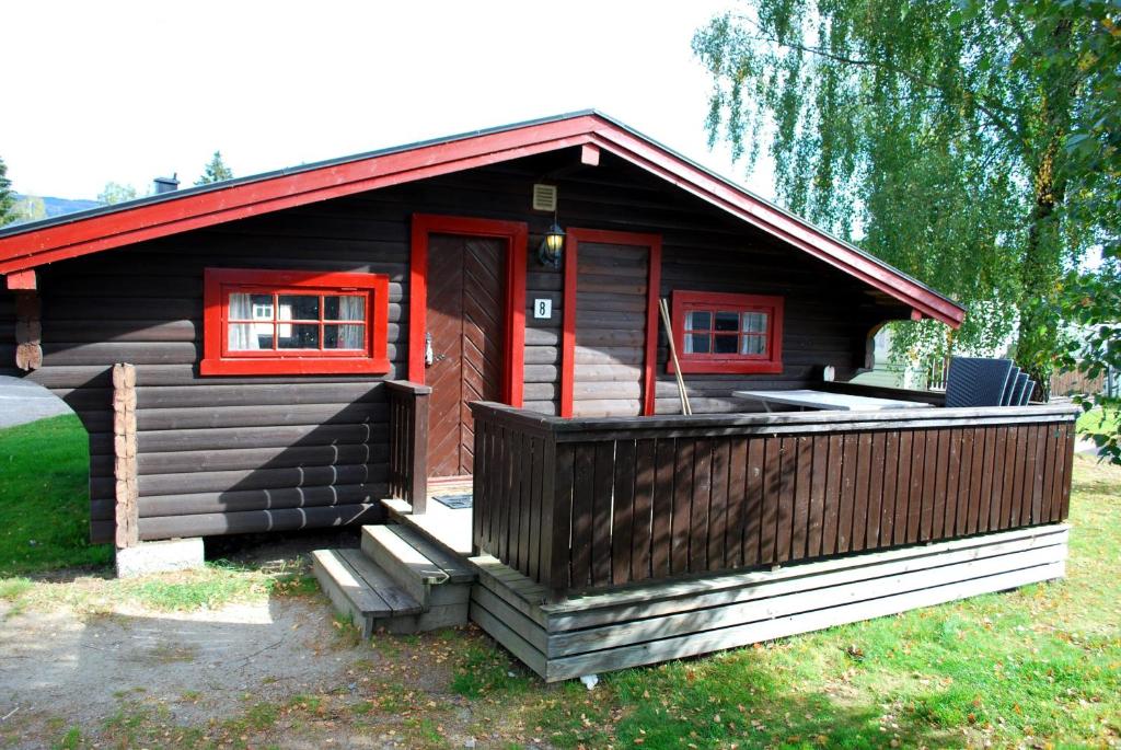Номер (Коттедж с 2 спальнями и общей внешней ванной комнатой) отеля Beverøya Camping, Бё