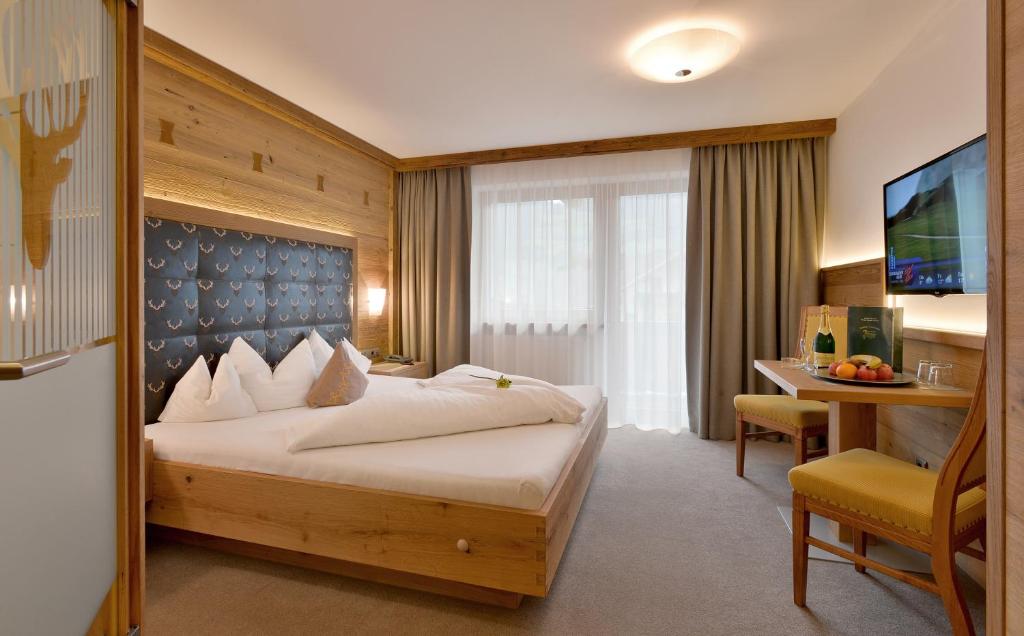 Двухместный (Двухместный номер с 1 кроватью и видом на горы) отеля Hotel Gasthof Jäger, Визинг