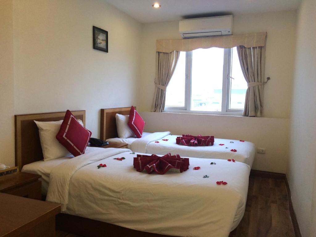 Двухместный (Двухместный номер Делюкс с 2 отдельными кроватями) гостевого дома Hanoi Charming Hotel, Ханой