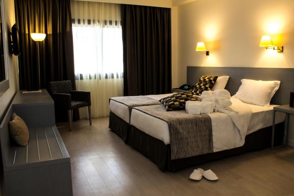 Двухместный (Двухместный номер с 1 кроватью или 2 отдельными кроватями) отеля Hotel Black Tulip - Porto Gaia, Вила-Нова-ди-Гая