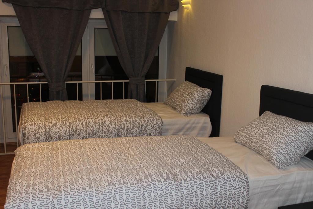 Двухместный (Двухместный номер Делюкс с 1 кроватью или 2 отдельными кроватями) гостевого дома Hotel Garni Emir, Кельн
