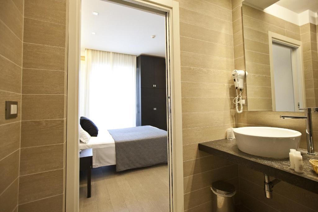 Двухместный (Двухместный номер с 1 кроватью или 2 отдельными кроватями) отеля Hotel Aurora, Римини