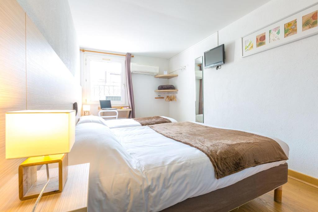 Двухместный (Двухместный номер с 2 отдельными кроватями) отеля Europe Hotel Vieux Port, Марсель