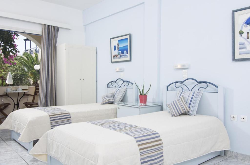 Трехместный (Трехместный номер) апарт-отеля Paradise Resort, Акротирион