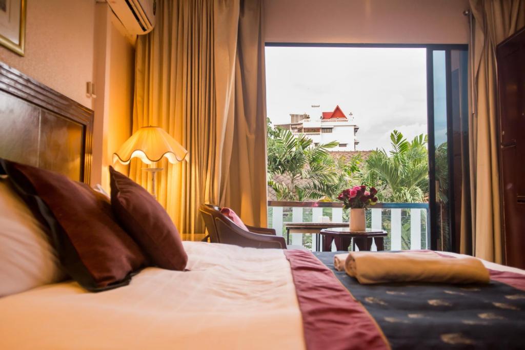 Двухместный (Улучшенный двухместный номер с 1 кроватью или 2 отдельными кроватями) отеля Diamond City, Бангкок