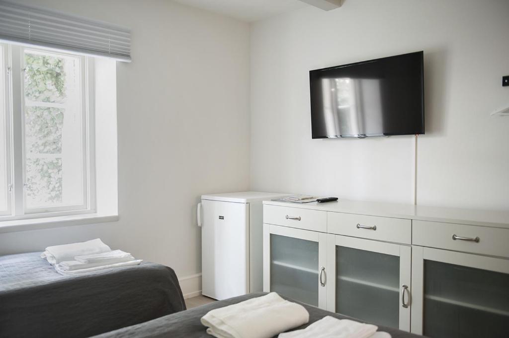 Двухместный (Улучшенный двухместный номер с 1 кроватью или 2 отдельными кроватями) отеля Mullbärsgårdens Bed and Breakfast, Висбю