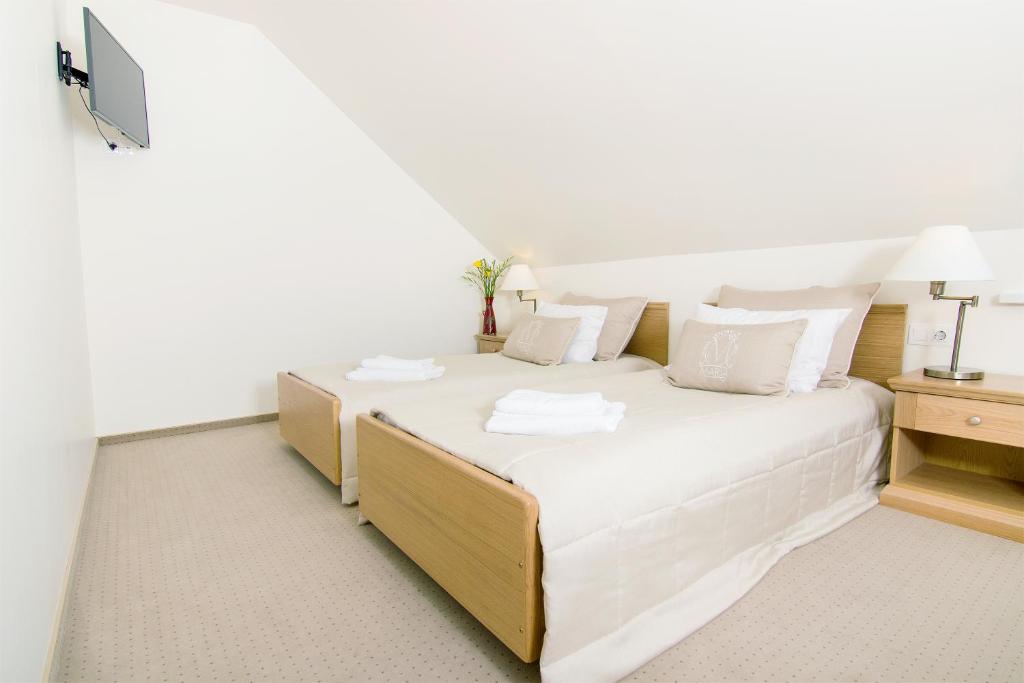 Двухместный (Улучшенный двухместный номер с 1 кроватью или 2 отдельными кроватями) отеля Hotel Domus Maria, Вильнюс