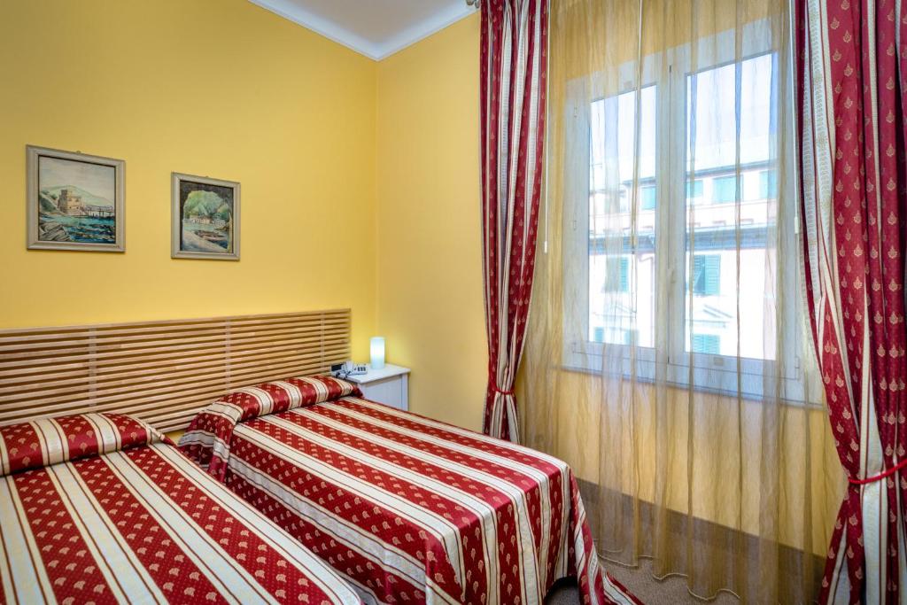 Двухместный (Двухместный номер с 1 кроватью или 2 отдельными кроватями - В дополнительном здании) отеля Hotel Boccascena, Генуя