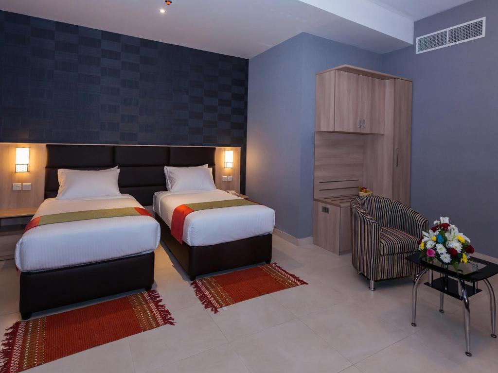 Двухместный (Двухместный номер Делюкс с 2 отдельными кроватями) отеля Flora Square Hotel, Дубай