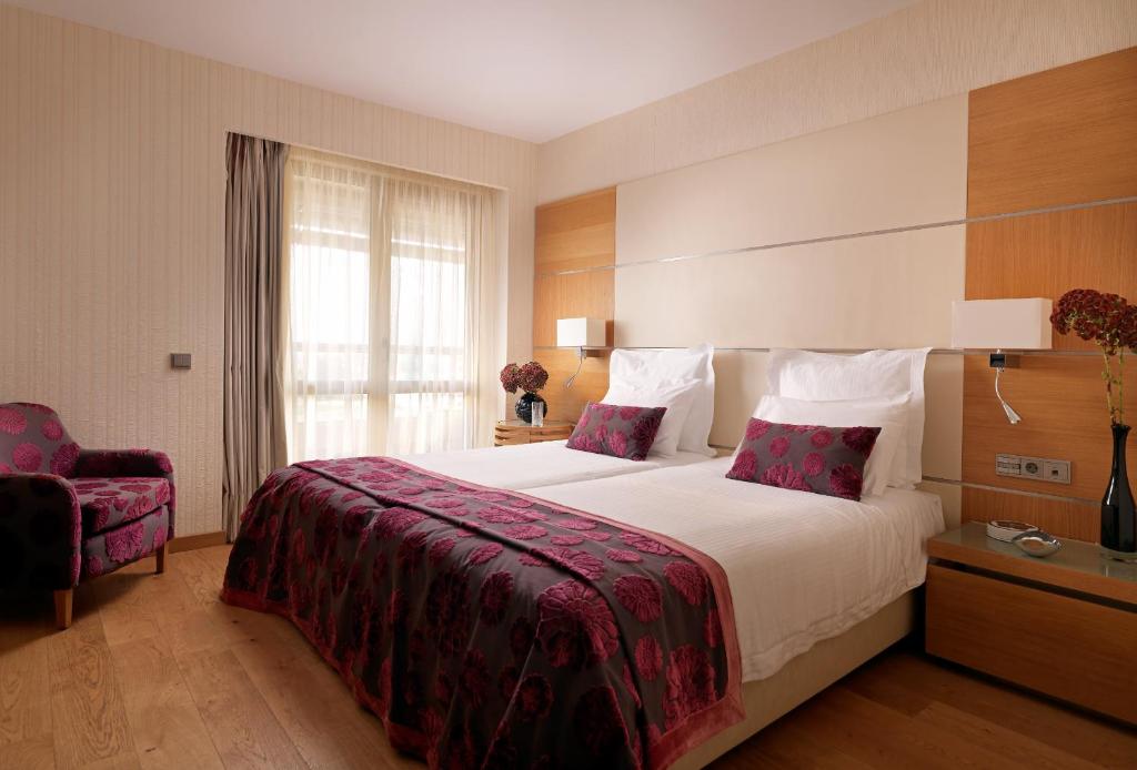 Двухместный (Улучшенный двухместный номер с 1 кроватью или 2 отдельными кроватями) отеля Divani Apollon Suites, Афины