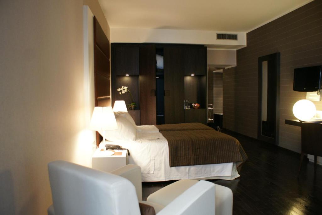 Двухместный (Улучшенный двухместный номер с 1 кроватью или 2 отдельными кроватями) отеля Hotel Palazzo Sitano, Палермо