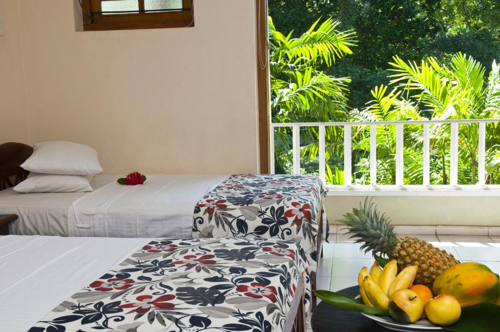 Двухместный (Двухместный номер Делюкс с 1 кроватью или 2 отдельными кроватями, вид на сад) отеля Hotel Sunflower, Катарагама