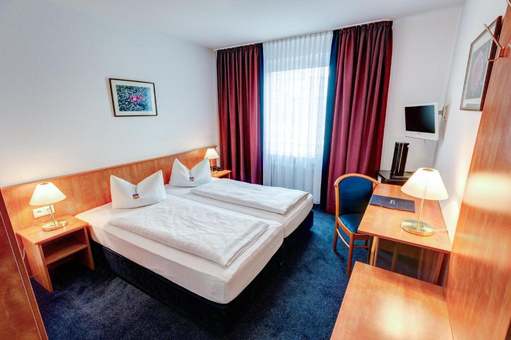 Двухместный (Двухместный номер «Комфорт» с 1 кроватью или 2 отдельными кроватями) отеля Hotel Antares, Мюнхен