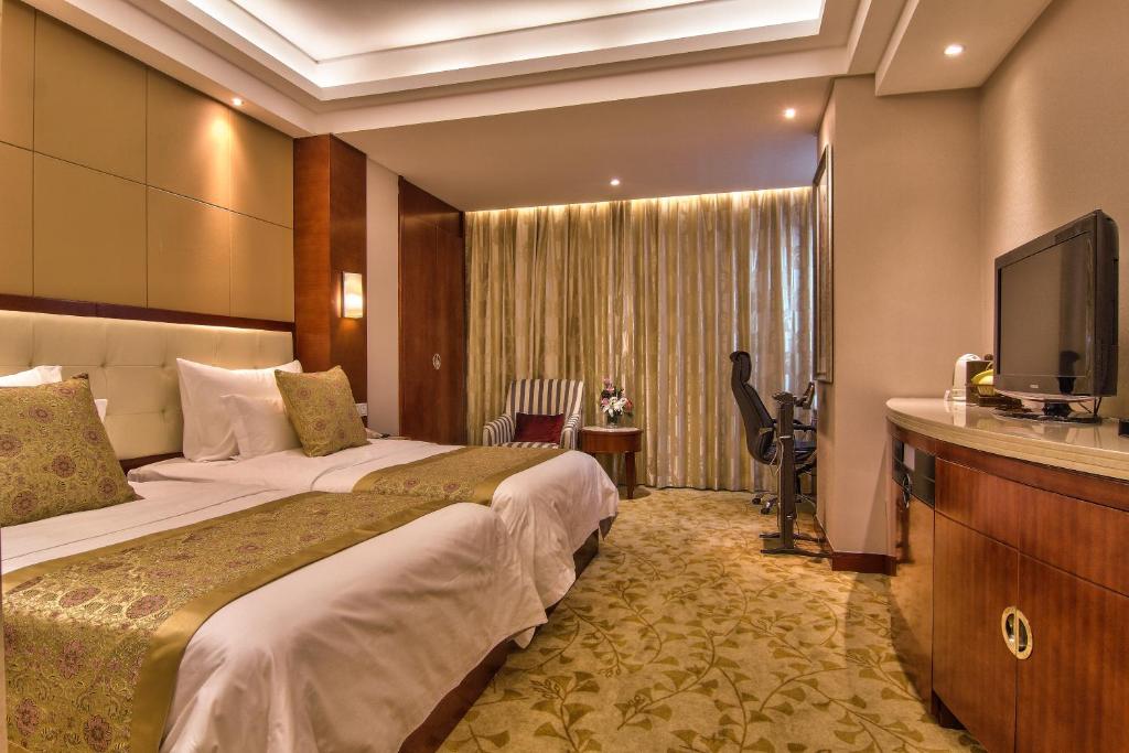Двухместный (Улучшенный двухместный номер с 1 кроватью и видом на реку) отеля Citic Ningbo International Hotel, Нинбо