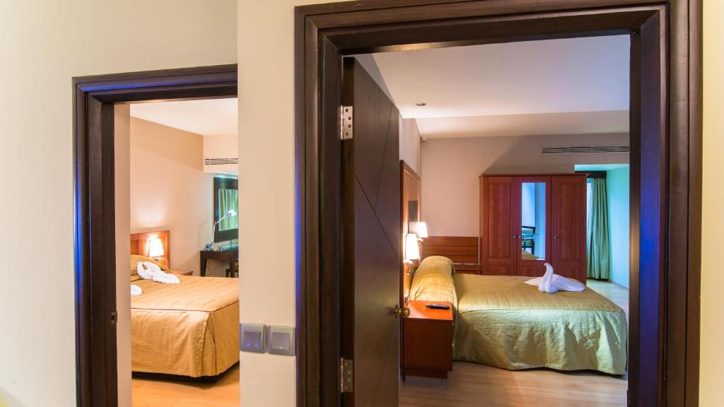 Апартаменты (Апартаменты Делюкс с 2 спальнями и кухней) апарт-отеля Halcyon Condominiums, Бангалор