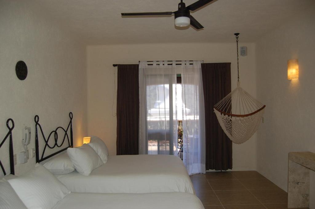 Сьюит (Люкс с 2 двуспальными кроватями) отеля Hostal de la Luz - Spa Holistic Resort, Тепостлан