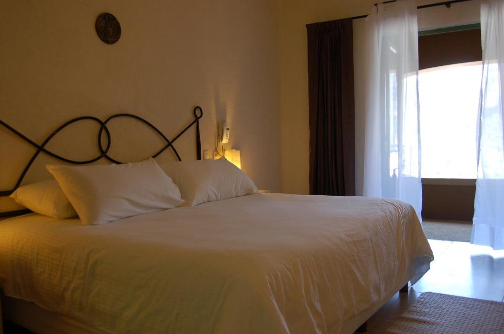 Двухместный (Стандартный номер с кроватью размера «king-size») отеля Hostal de la Luz - Spa Holistic Resort, Тепостлан