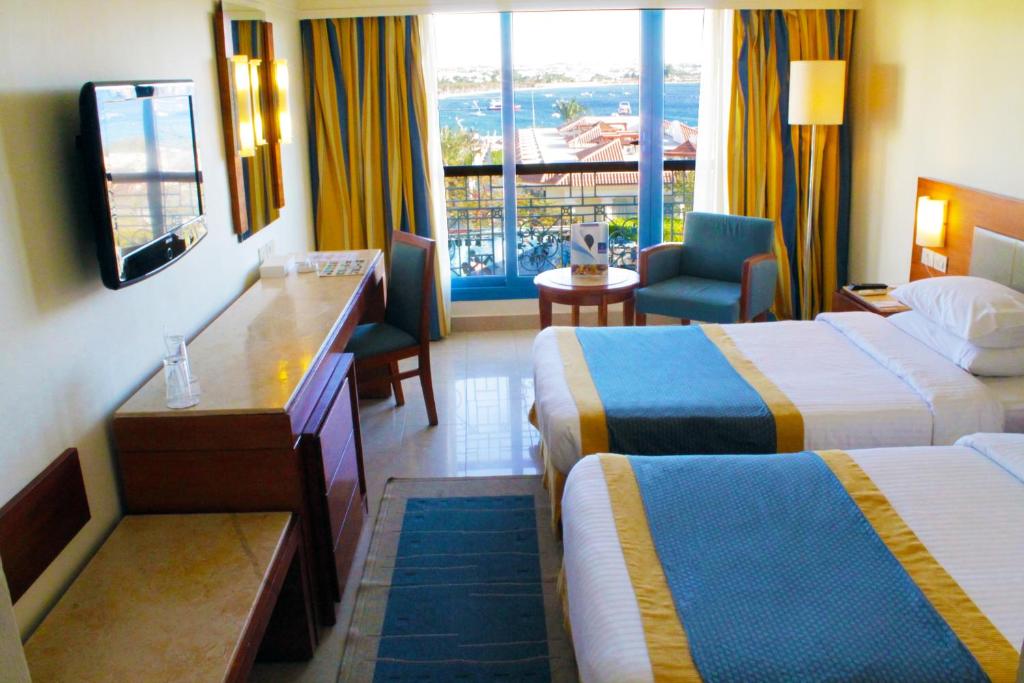 Двухместный (Стандартный двухместный номер с 1 кроватью или 2 отдельными кроватями, вид на море) курортного отеля Helnan Marina Sharm Hotel, Шарм-эль-Шейх