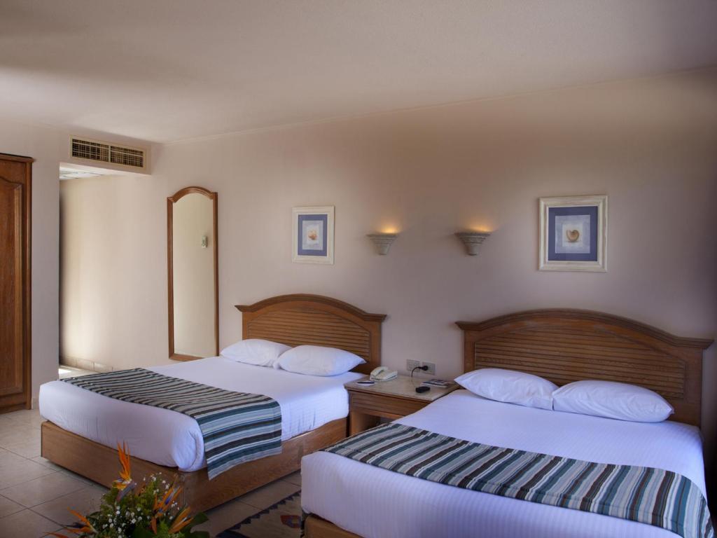 Трехместный (Трехместный номер с видом на море) курортного отеля Hurghada Coral Beach Hotel (Ex. Rotana), Хургада