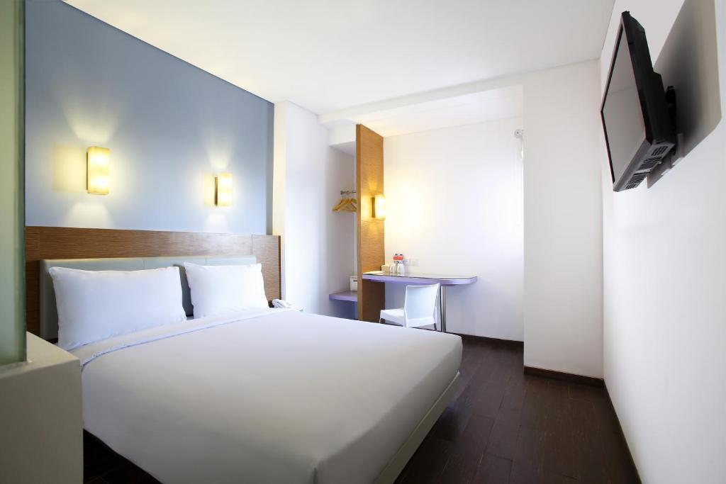 Двухместный (Элегантный номер с кроватью размера «queen-size») отеля Amaris Hotel Pasar Baru, Джакарта