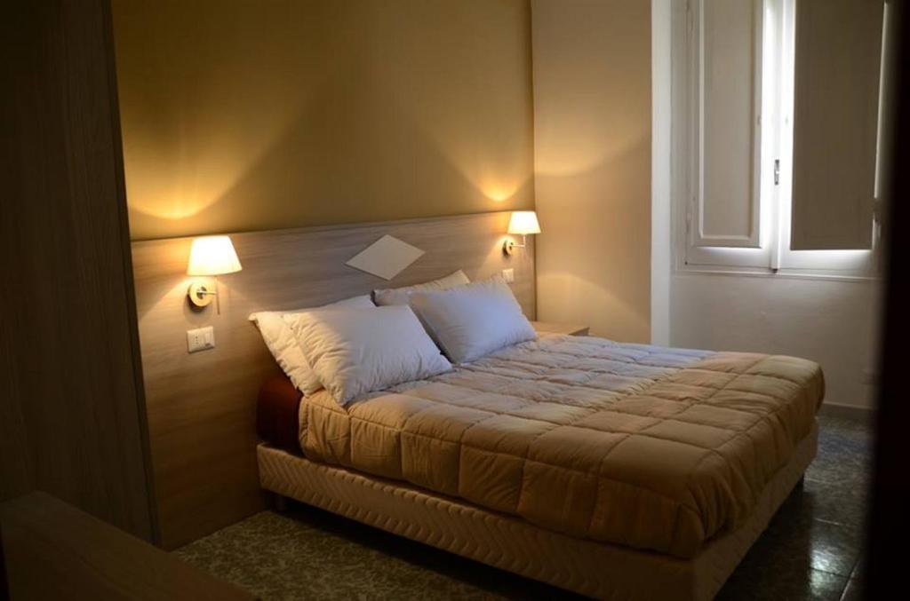 Двухместный (Двухместный номер с 1 кроватью или 2 отдельными кроватями, общая ванная комната) гостевого дома Kaliè Rooms Guest House, Кальяри