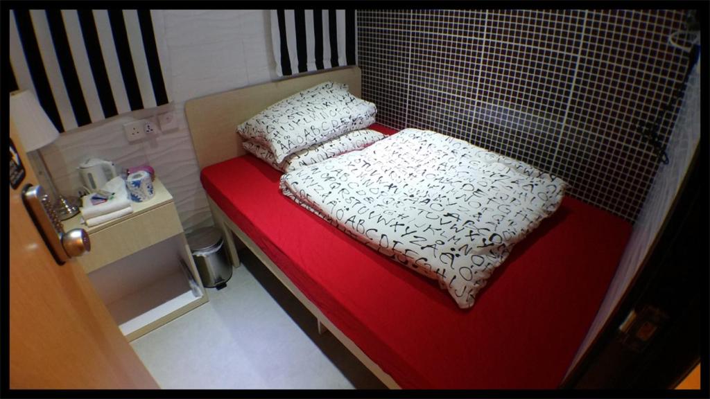 Двухместный (Стандартный двухместный номер с 1 кроватью и общей ванной комнатой) гостевого дома Micro Hotel, Гонконг (город)