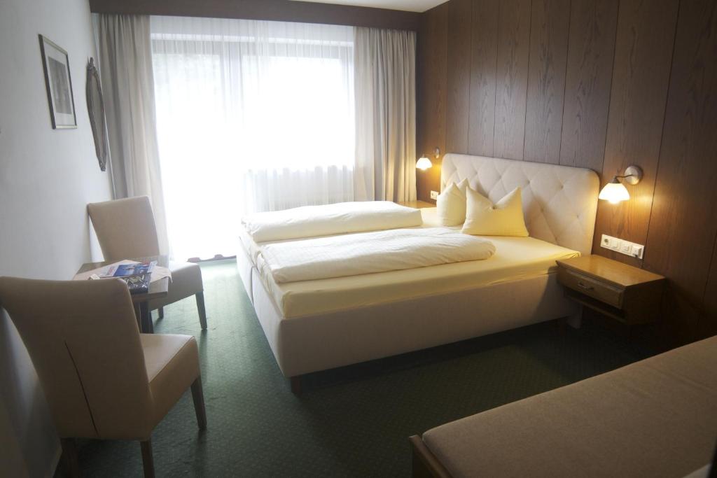 Четырехместный (Четырехместный номер) отеля Hotel Sonnhof, Инсбрук