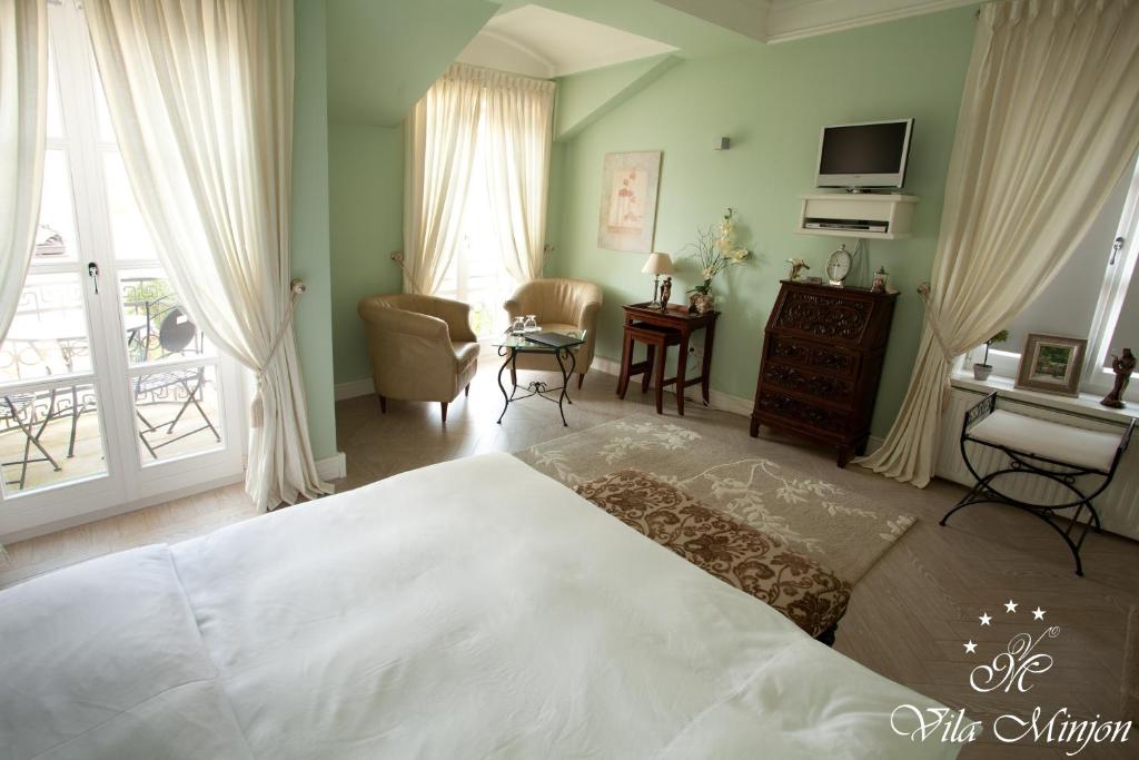 Двухместный (Двухместный номер Делюкс с 1 кроватью и дополнительной кроватью) отеля Luxury Rooms Minjon, Врнячка-Баня