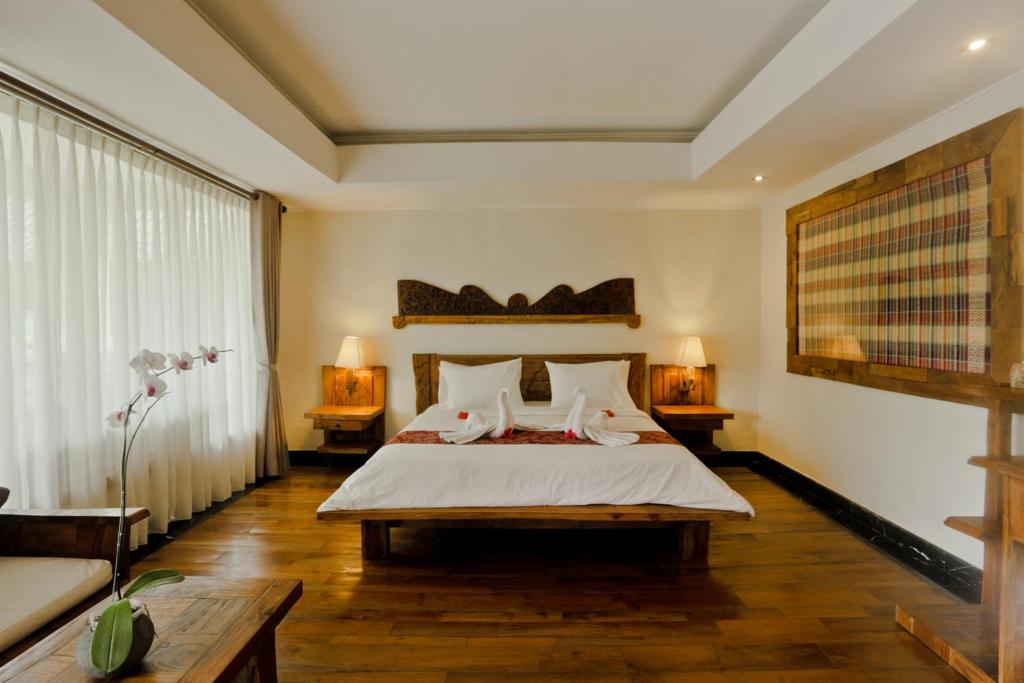 Сьюит (Двухуровневый люкс с бесплатным сеансом массажа по прибытии) отеля Sri Ratih Cottages, Убуд