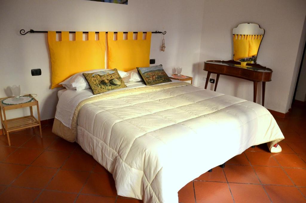Двухместный (Улучшенный двухместный номер с 1 кроватью или 2 отдельными кроватями и видом на сад) отеля L'Acchiappasogni, Флоренция