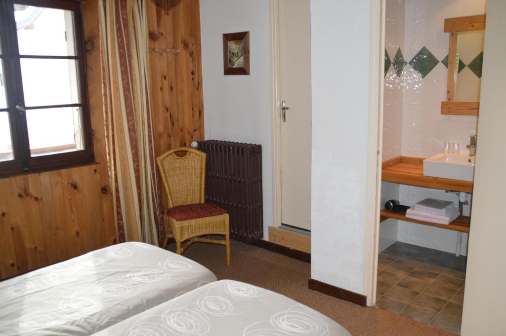 Двухместный (Двухместный номер с 2 отдельными кроватями) отеля Hotel Le Genepy, Тинь