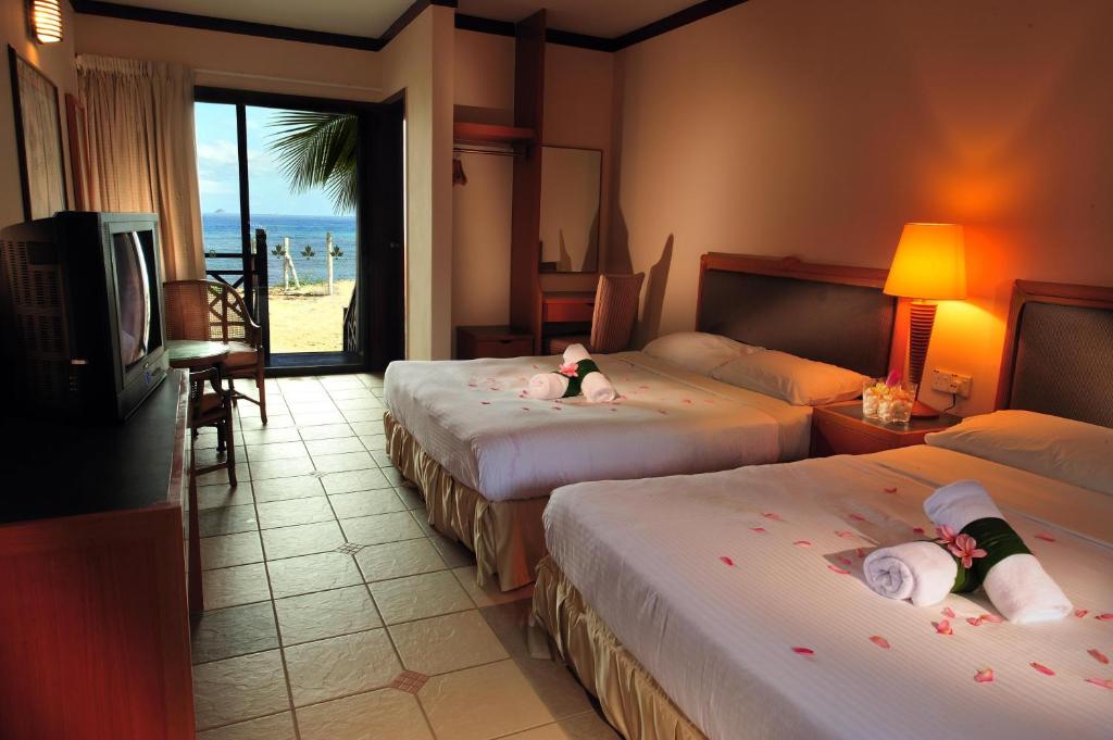 Номер (Улучшенное шале - На пляже) курортного отеля Paya Beach Spa & Dive Resort, Тиоман