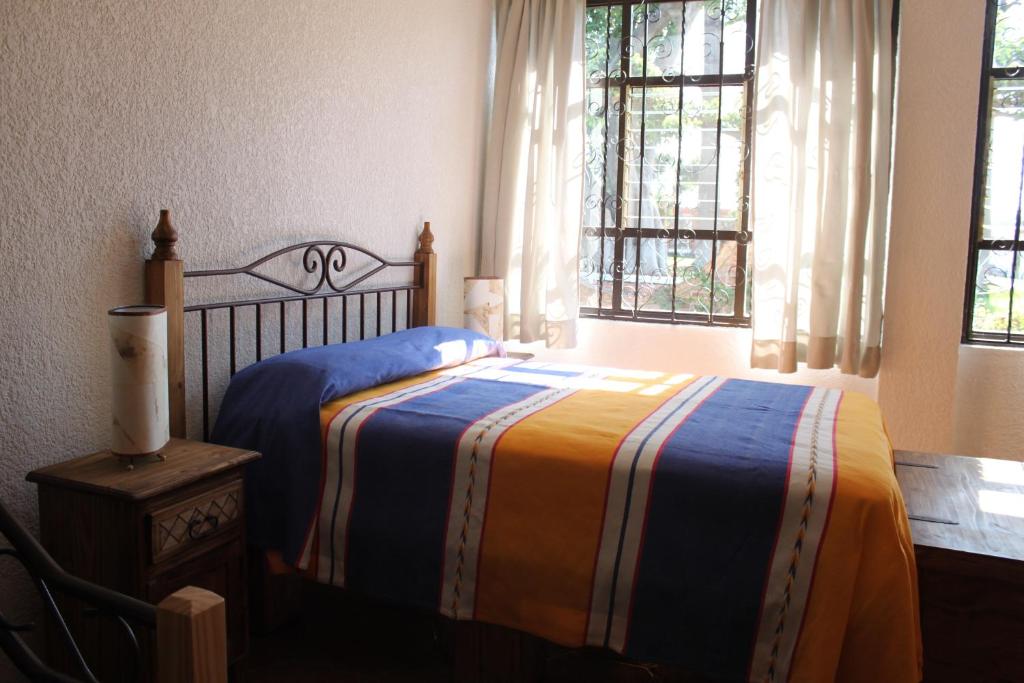 Сьюит (Стандартный двухместный люкс с 1 кроватью) отеля Hotel Boutique Hacienda La Villa Real, Куаутла-Морелос