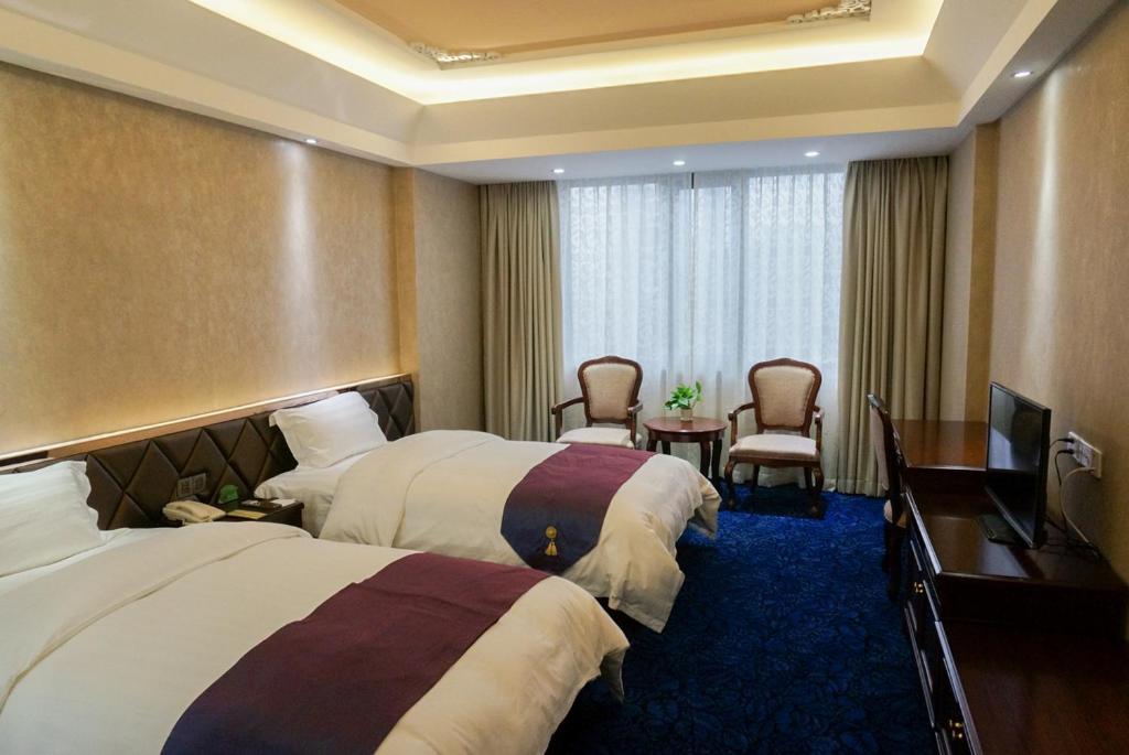 Двухместный (Двухместный номер бизнес-класса с 1 кроватью или 2 отдельными кроватями) отеля Guangzhou Zhuhai Special Economic Zone Hotel, Гуанчжоу