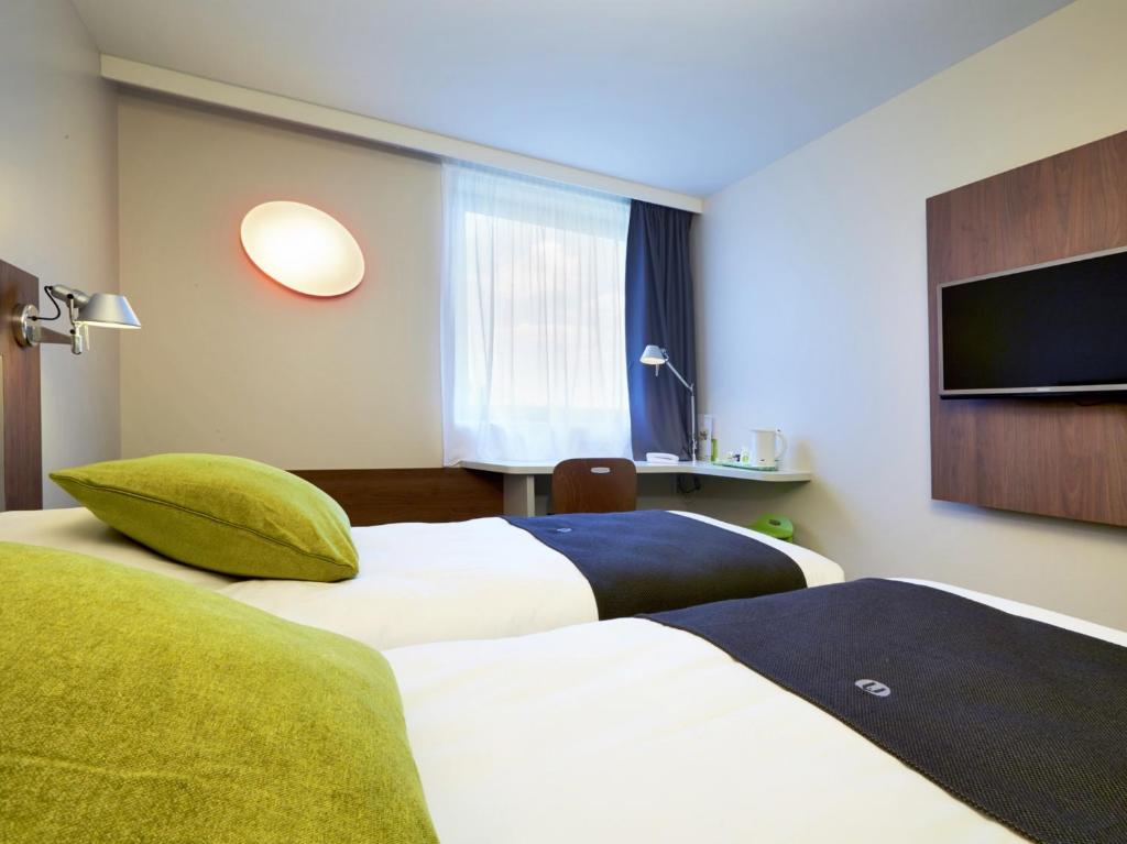 Двухместный (Улучшенный двухместный номер с 2 отдельными кроватями) отеля Campanile Bordeaux Ouest - Mérignac Aéroport, Бордо