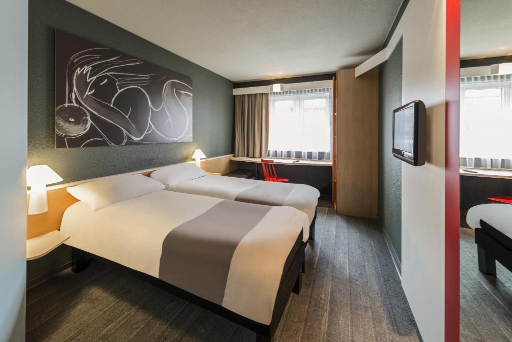Двухместный (Двухместный номер с 2 отдельными кроватями) отеля ibis München Parkstadt Schwabing, Мюнхен