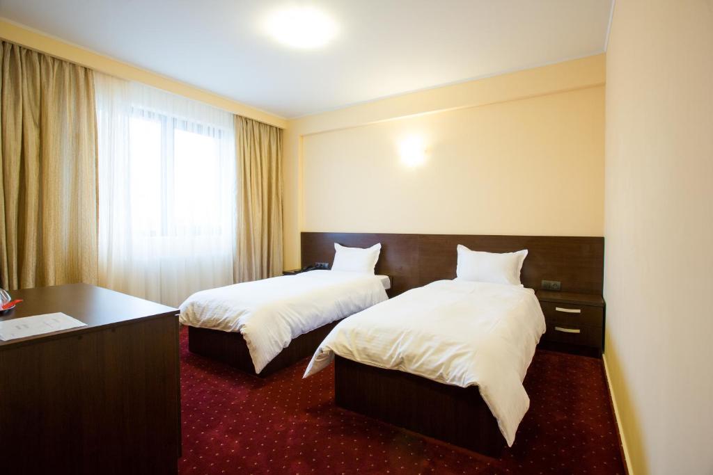 Одноместный (Одноместный номер Делюкс) отеля Hotel Athos, Бухарест