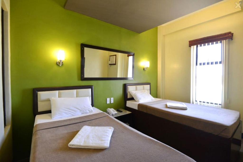 Двухместный (Стандартный двухместный номер с 2 отдельными кроватями) отеля Express Inn Mactan, Мактан