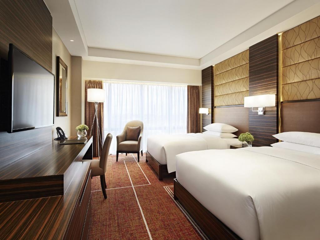 Двухместный (Стандартный двухместный номер с 2 отдельными кроватями) отеля Hyatt Regency Manila City of Dreams, Манила