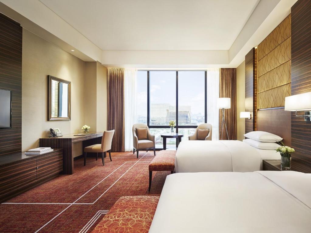 Двухместный (Клубный двухместный номер с 2 отдельными кроватями) отеля Hyatt Regency Manila City of Dreams, Манила