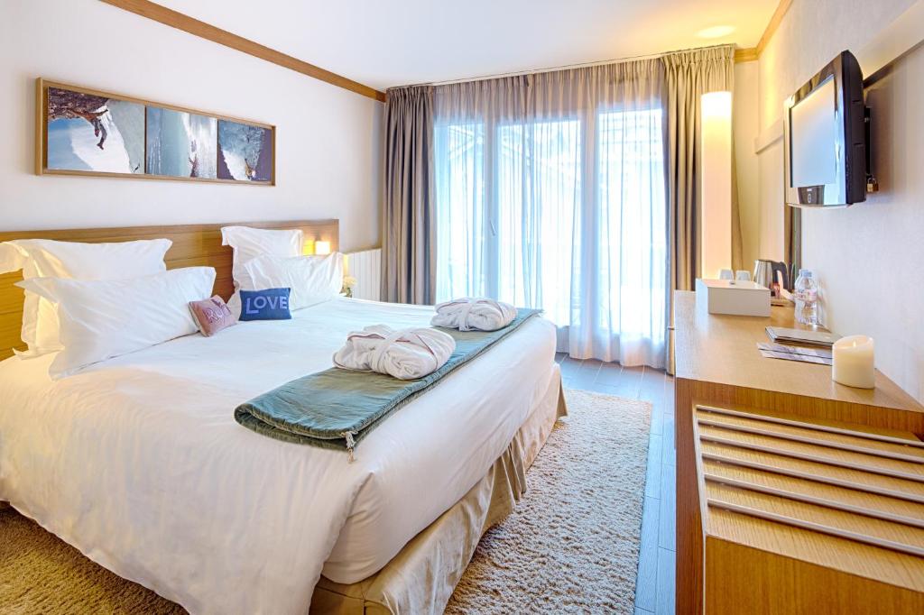 Двухместный (Улучшенный двухместный номер с 1 кроватью или 2 отдельными кроватями) отеля Boutique Hotel Le Morgane, Шамони-Мон-Блан