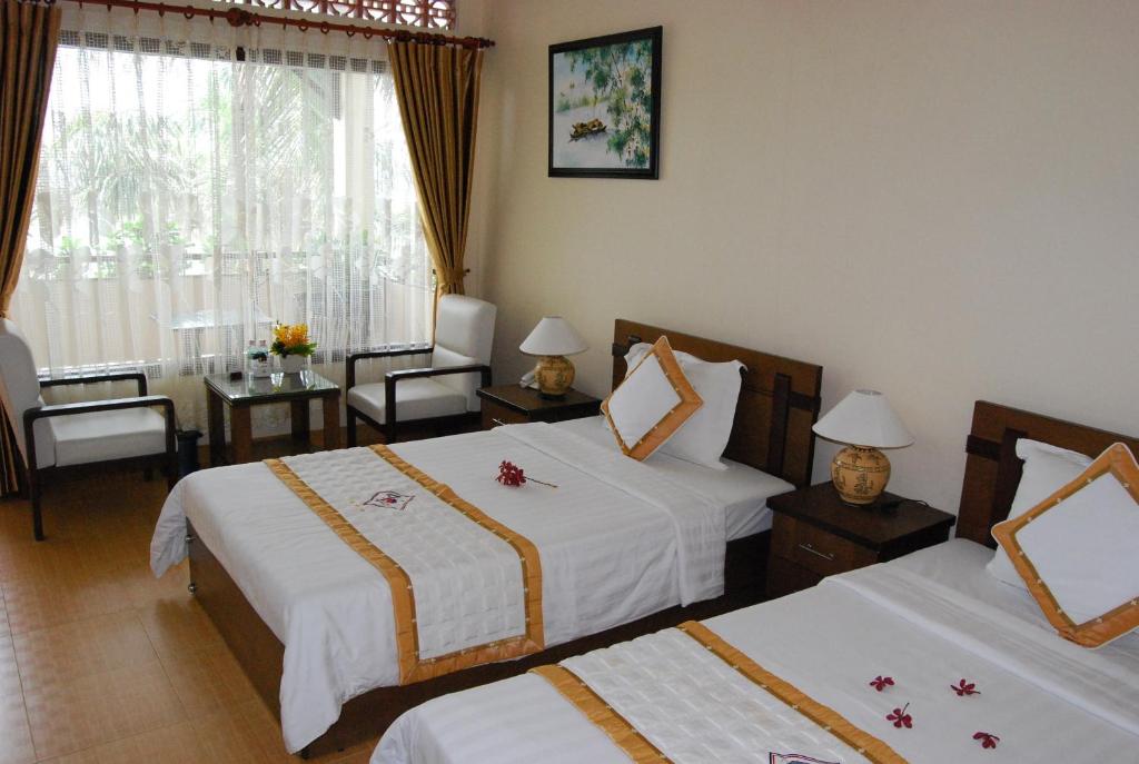 Двухместный (Двухместный номер Делюкс с 1 кроватью или 2 отдельными кроватями и видом на море - С видом на холмы) курортного отеля Tien Dat Resort, Фантхьет